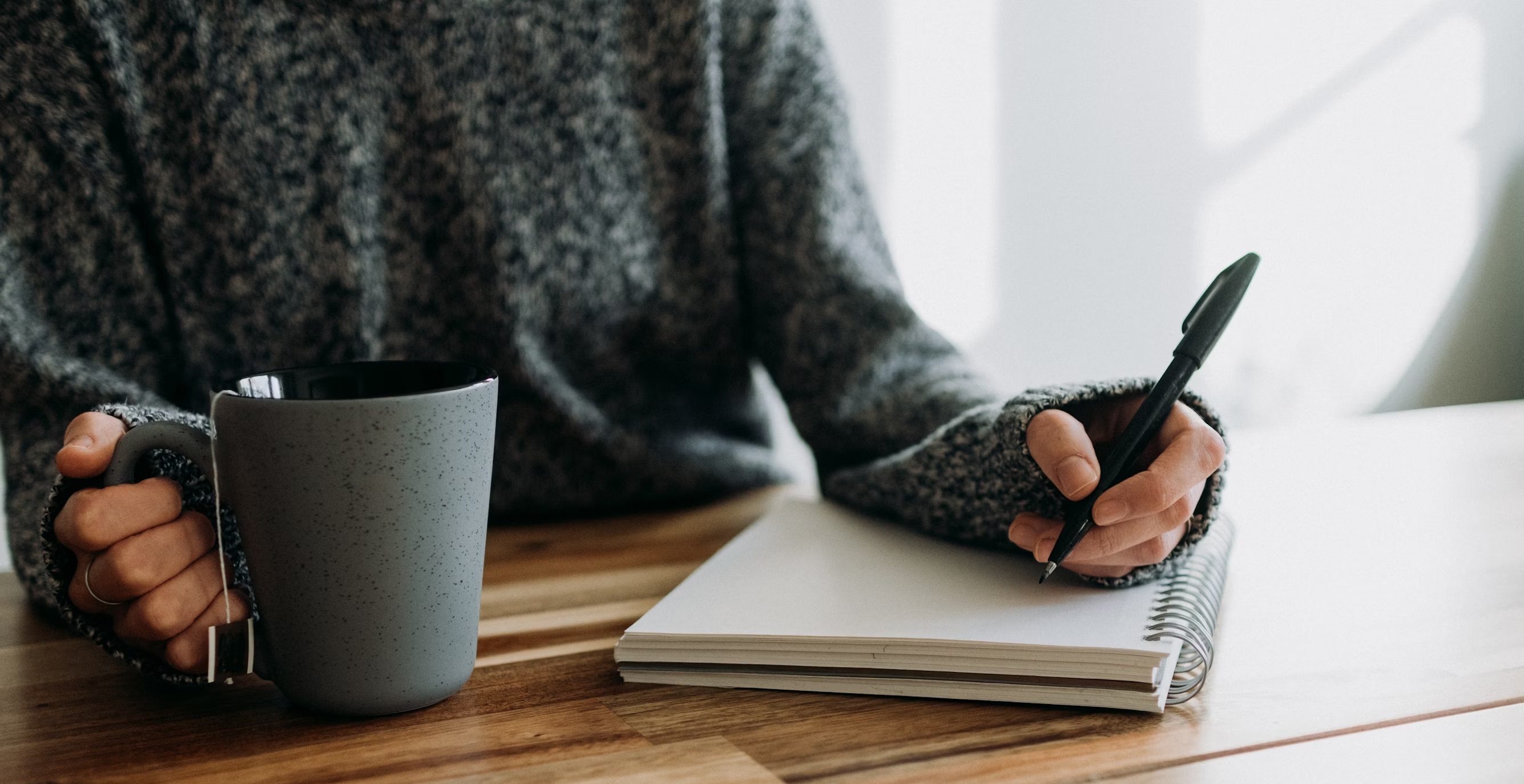 background image of someone writing